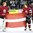 MINSK, BELARUS - MAY 10: Latvia's Kristers Gudlevskis #50 and Roberts Lipsbergs #29 holding the Latvian flag after a 3-2 preliminary round win over Finland at the 2014 IIHF Ice Hockey World Championship. (Photo by Andre Ringuette/HHOF-IIHF Images)

